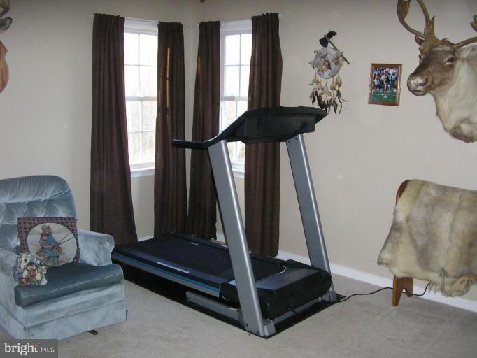 7501 Scotts Farm Road Spotsylvania, VA 22553 - Photo 21 of 23 3rd bedroom with neutral colors, exercise room