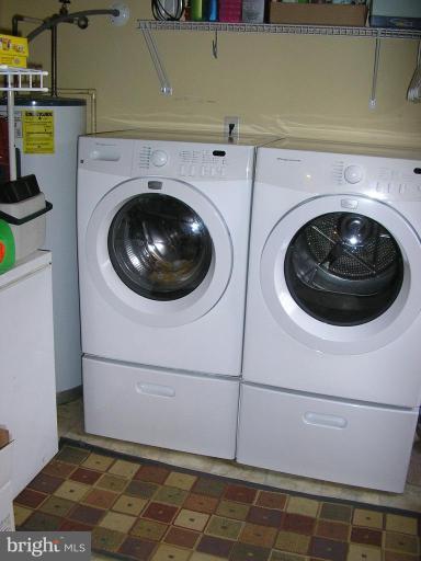 7501 Scotts Farm Road Spotsylvania, VA 22553 - Photo 22 of 23 Separate laundry room next to kitchen door to deck