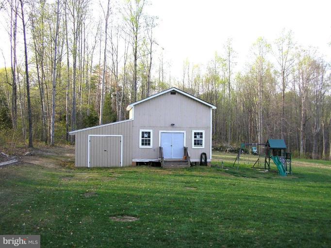 7501 Scotts Farm Road Spotsylvania, VA 22553 - Photo 6 of 23 Great yard with wooded acreage behind barn