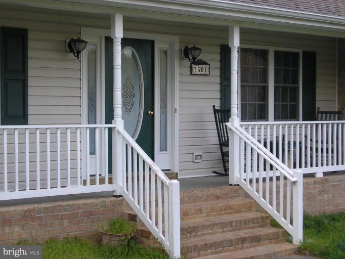 7501 Scotts Farm Road Spotsylvania, VA 22553 - Photo 8 of 23 Rocking chair front porch welcomes you!