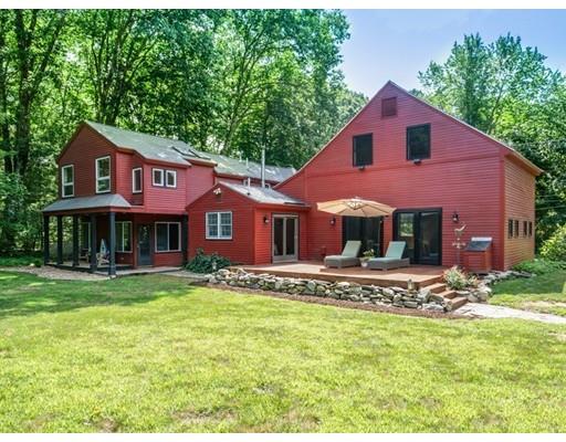 1001 Depot Road Boxborough, MA 01719 - Photo 1 of 34 a front view of a house with a yard