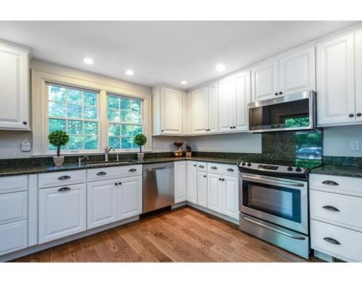 1001 Depot Road Boxborough, MA 01719 - Photo 11 of 34 a kitchen with stainless steel appliances granite countertop a stove a sink and a microwave
