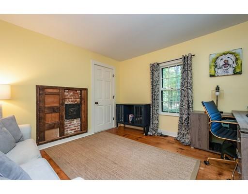 1001 Depot Road Boxborough, MA 01719 - Photo 19 of 34 a living room with furniture a window and a fireplace