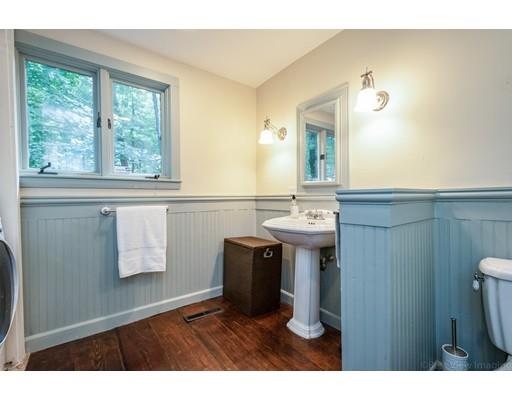 1001 Depot Road Boxborough, MA 01719 - Photo 20 of 34 a bathroom with a sink mirror and window