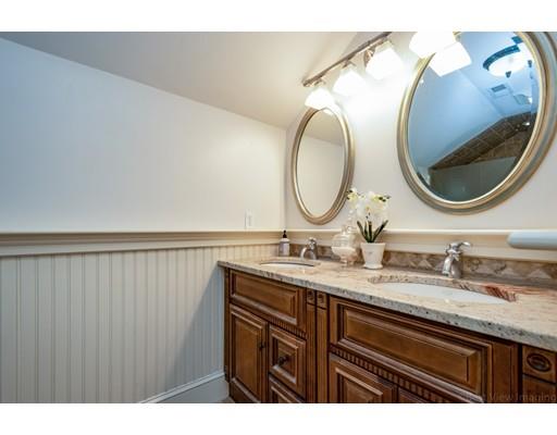 1001 Depot Road Boxborough, MA 01719 - Photo 23 of 34 a bathroom with a sink and a mirror