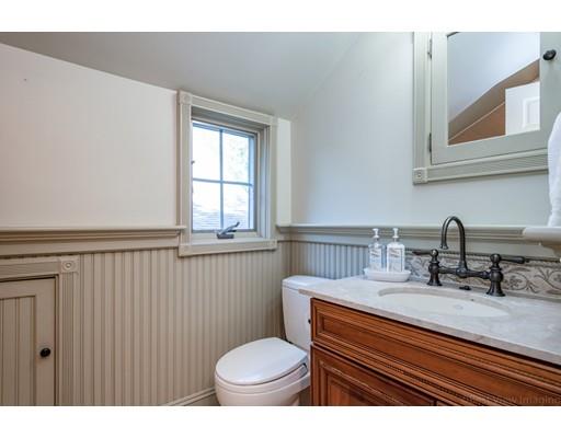 1001 Depot Road Boxborough, MA 01719 - Photo 25 of 34 a bathroom with a sink a toilet and mirror