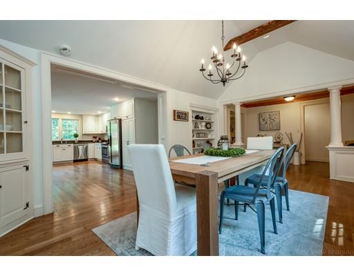 1001 Depot Road Boxborough, MA 01719 - Photo 9 of 34 a view of a dining room with furniture and wooden floor