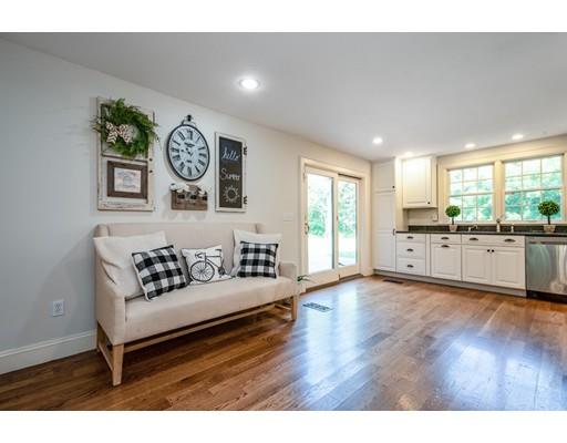 1001 Depot Road Boxborough, MA 01719 - Photo 10 of 34 a living room with granite countertop couch and a window