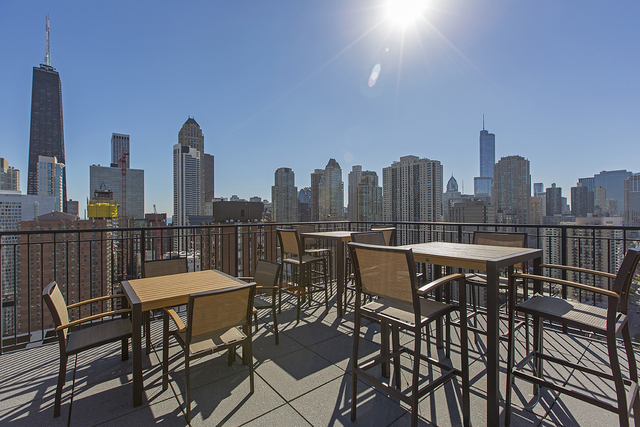 100 West Chestnut Street, Unit 503 Chicago, IL 60610 - Photo 3 of 18 a view of a terrace with sitting area