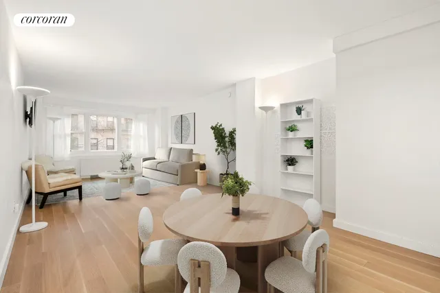 a kitchen with a stove a sink and a microwave