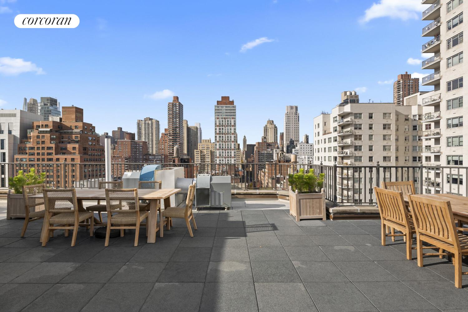 520 East 76th Street, Unit 4H Manhattan, NY 10021 - Photo 9 of 10 a view of a terrace with lawn chairs and iron fence