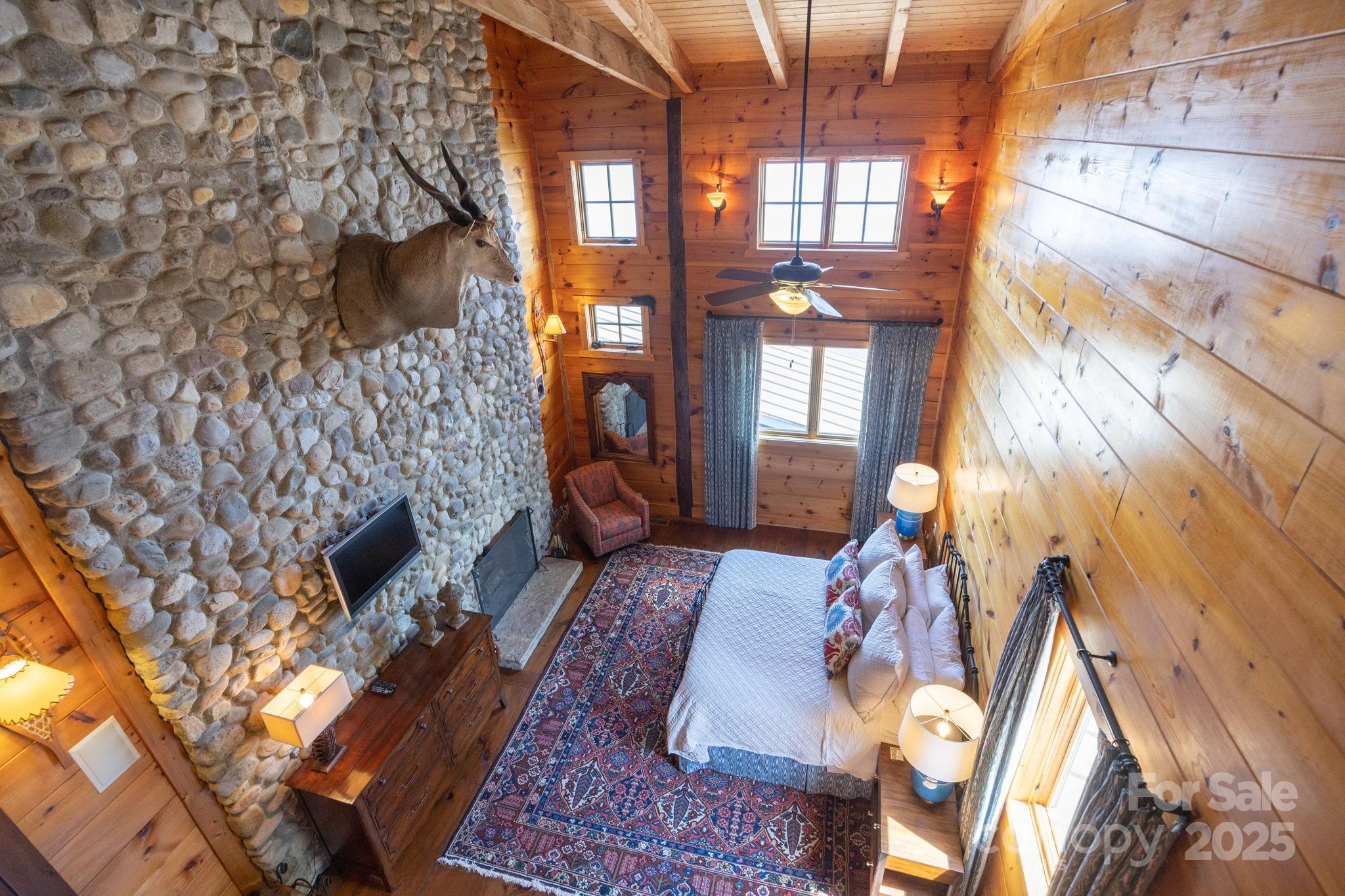 197 Smooth Rock Point Ridgeway, SC 29130 - Photo 26 of 48 a living room with furniture and a fireplace