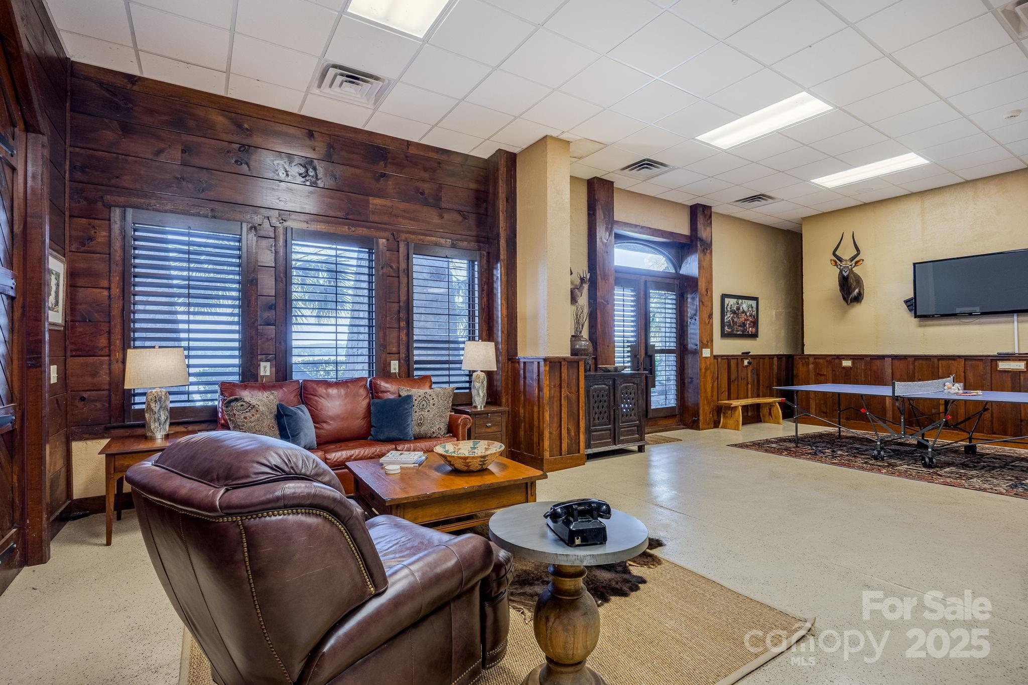 197 Smooth Rock Point Ridgeway, SC 29130 - Photo 33 of 48 a living room with furniture and a flat screen tv