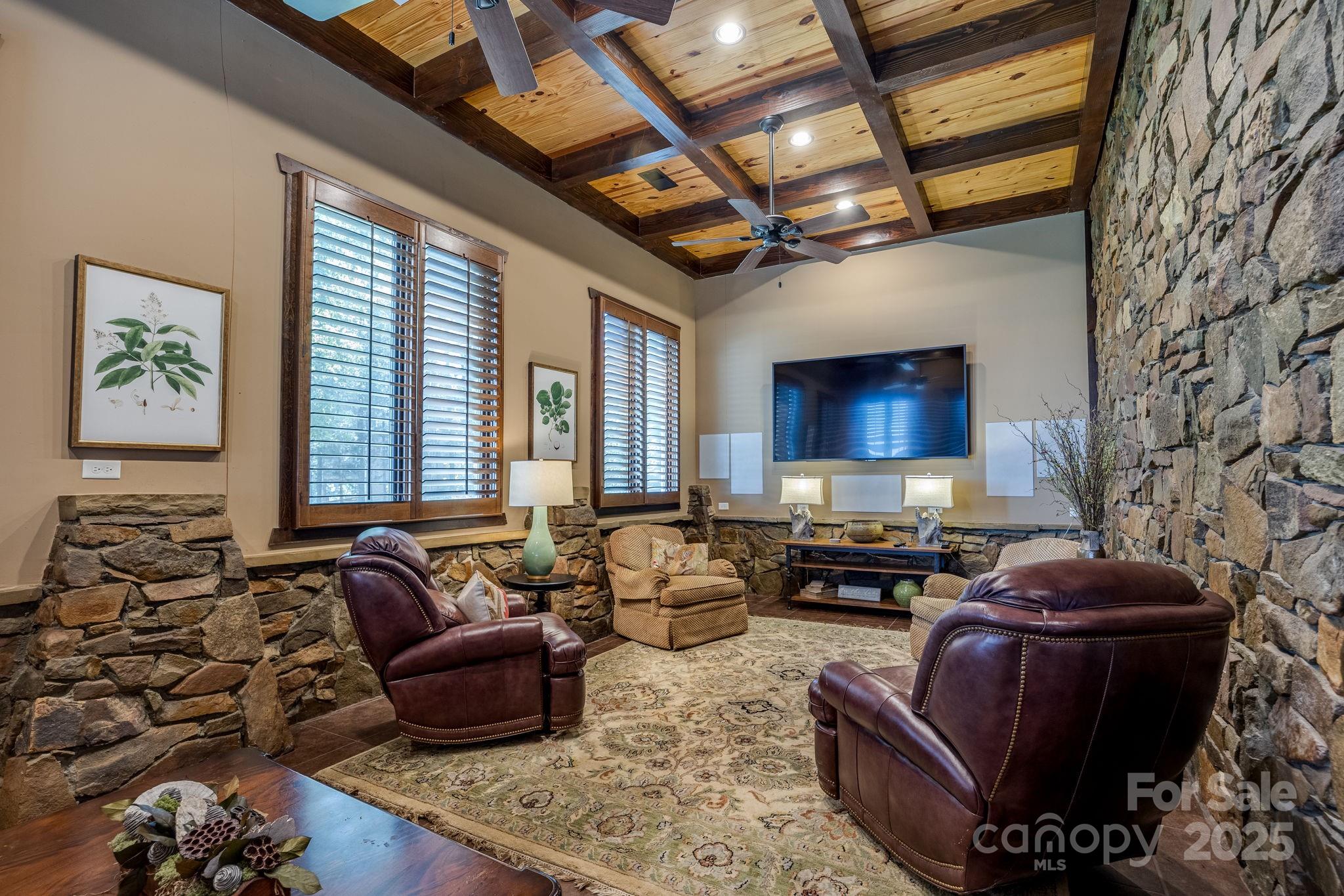 197 Smooth Rock Point Ridgeway, SC 29130 - Photo 35 of 48 a living room with furniture and a flat screen tv