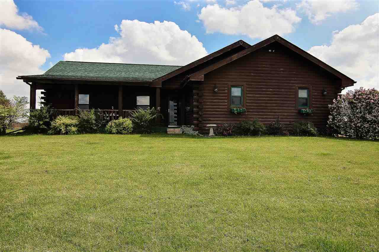 15232 Kelley Road Pecatonica, IL 61063 - Photo 1 of 24 a view of a house with garden