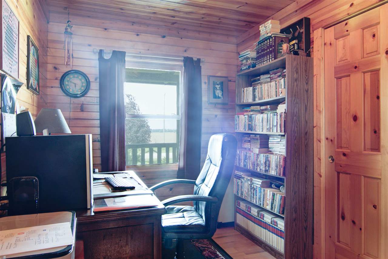 15232 Kelley Road Pecatonica, IL 61063 - Photo 14 of 24 a view of a workspace with furniture and a window