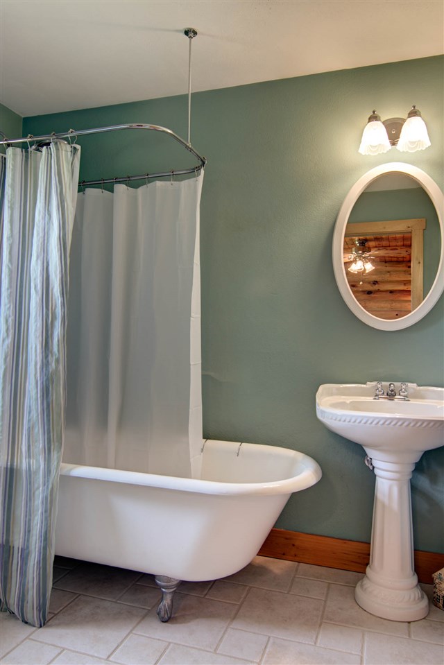15232 Kelley Road Pecatonica, IL 61063 - Photo 18 of 24 a bathroom with a sink and a mirror