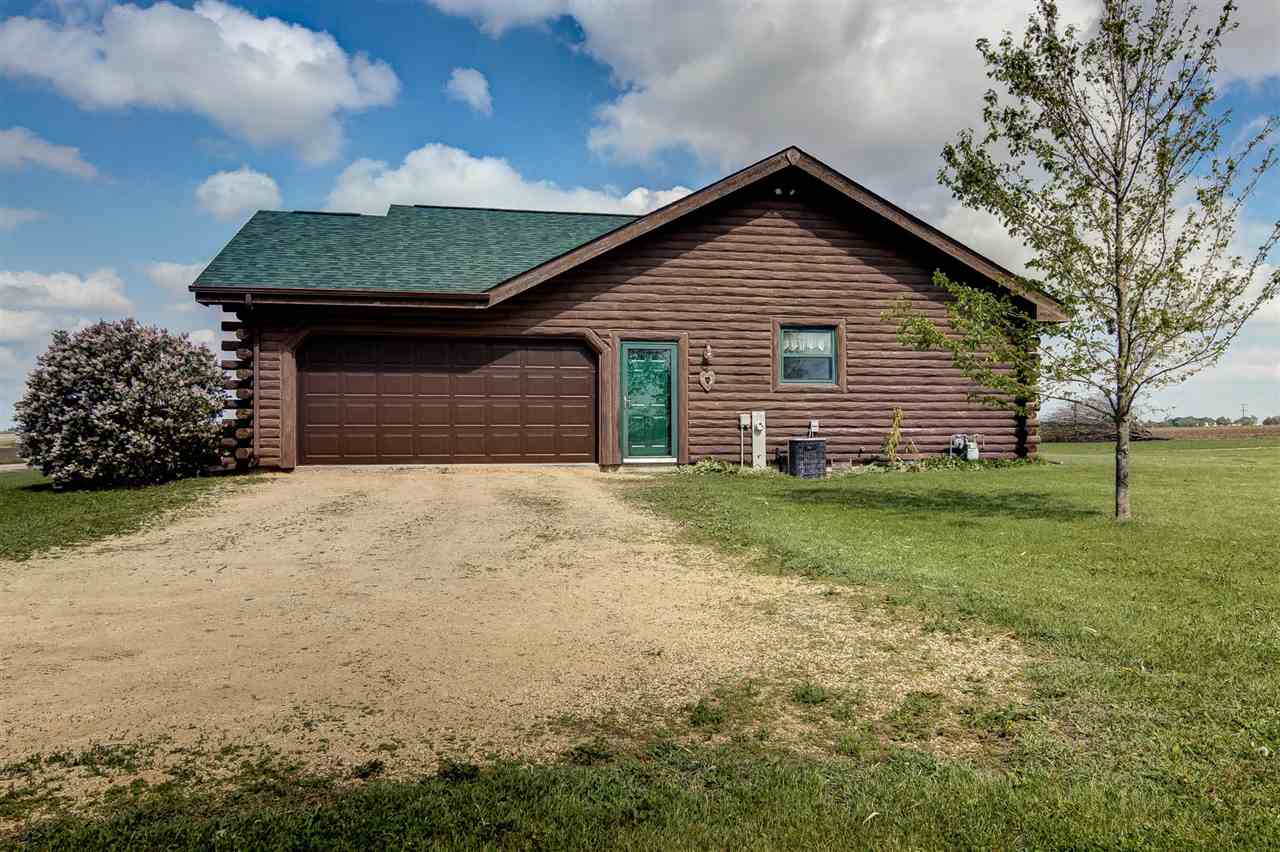15232 Kelley Road Pecatonica, IL 61063 - Photo 23 of 24 a view of a house with a yard