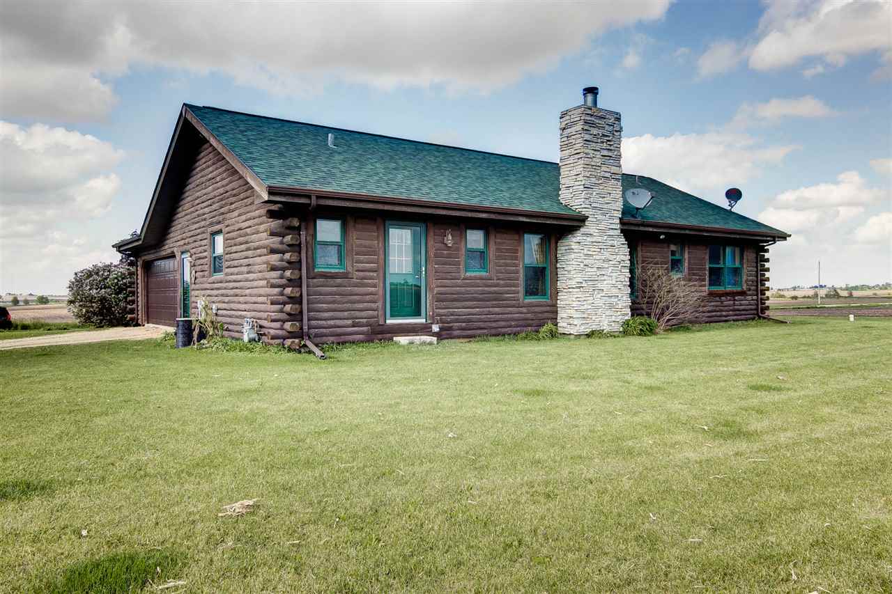 15232 Kelley Road Pecatonica, IL 61063 - Photo 24 of 24 a front view of a house with a garden