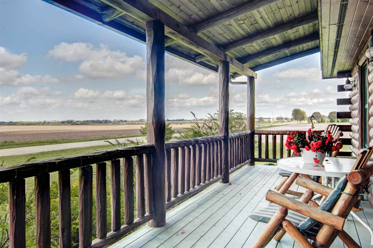 15232 Kelley Road Pecatonica, IL 61063 - Photo 4 of 24 a view of a balcony with wooden floor