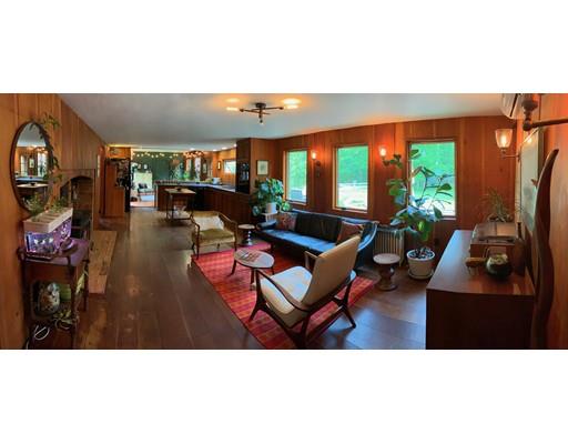54 Meetinghouse Road Pelham, MA 01002 - Photo 21 of 42 a living room with furniture and a large window