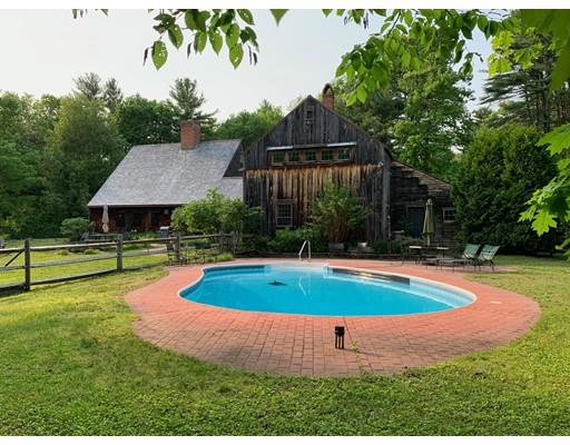 54 Meetinghouse Road Pelham, MA 01002 - Photo 8 of 42 a view of a house with swimming pool and yard