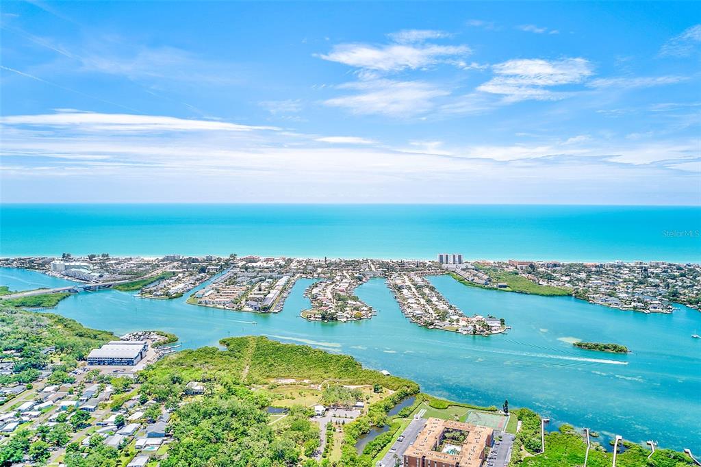 14079 Victoria Road Largo, FL 33774 - Photo 41 of 46 an aerial view of ocean and residential houses with outdoor space