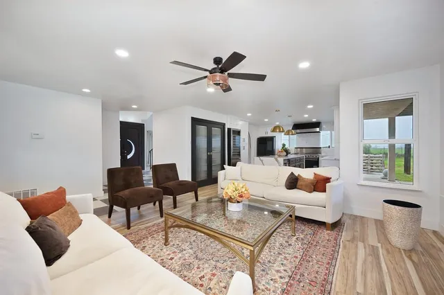 a bedroom with a bed and a couch