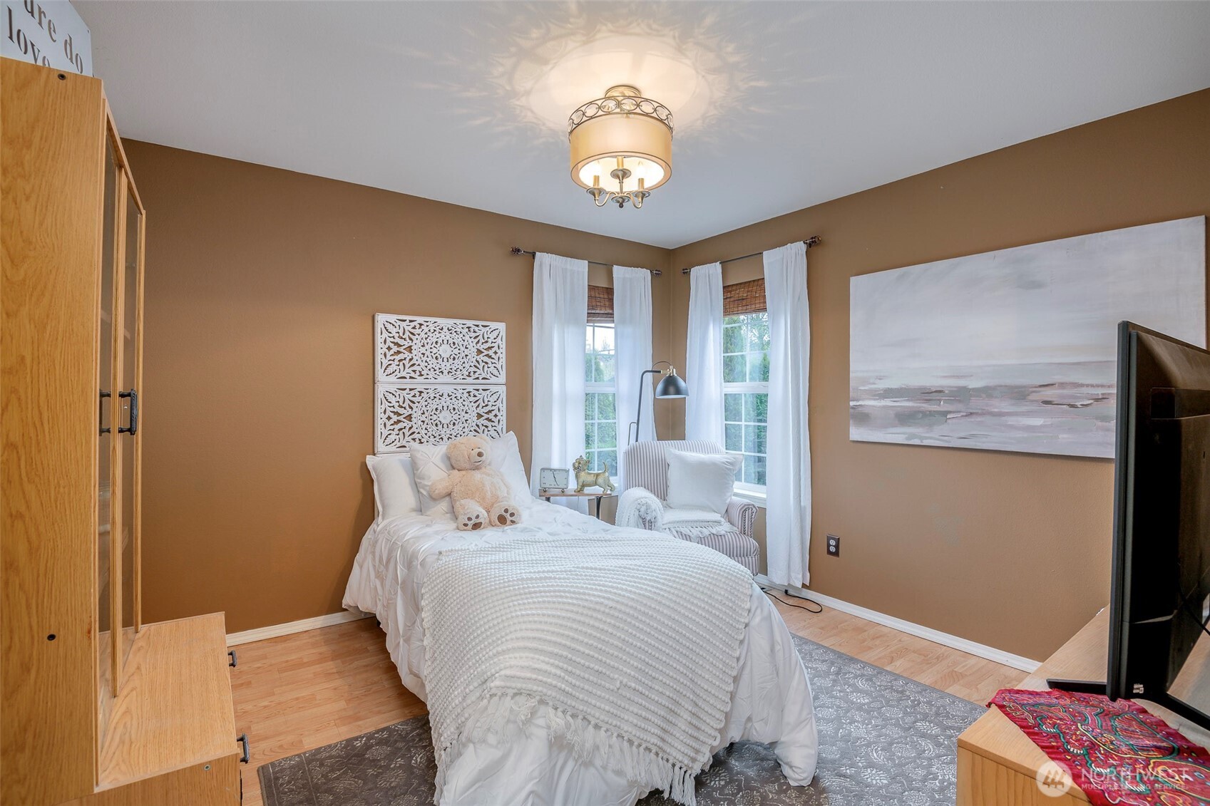 1310 Sequalish Street Steilacoom, WA 98388 - Photo 14 of 30 a bedroom with a bed and a window