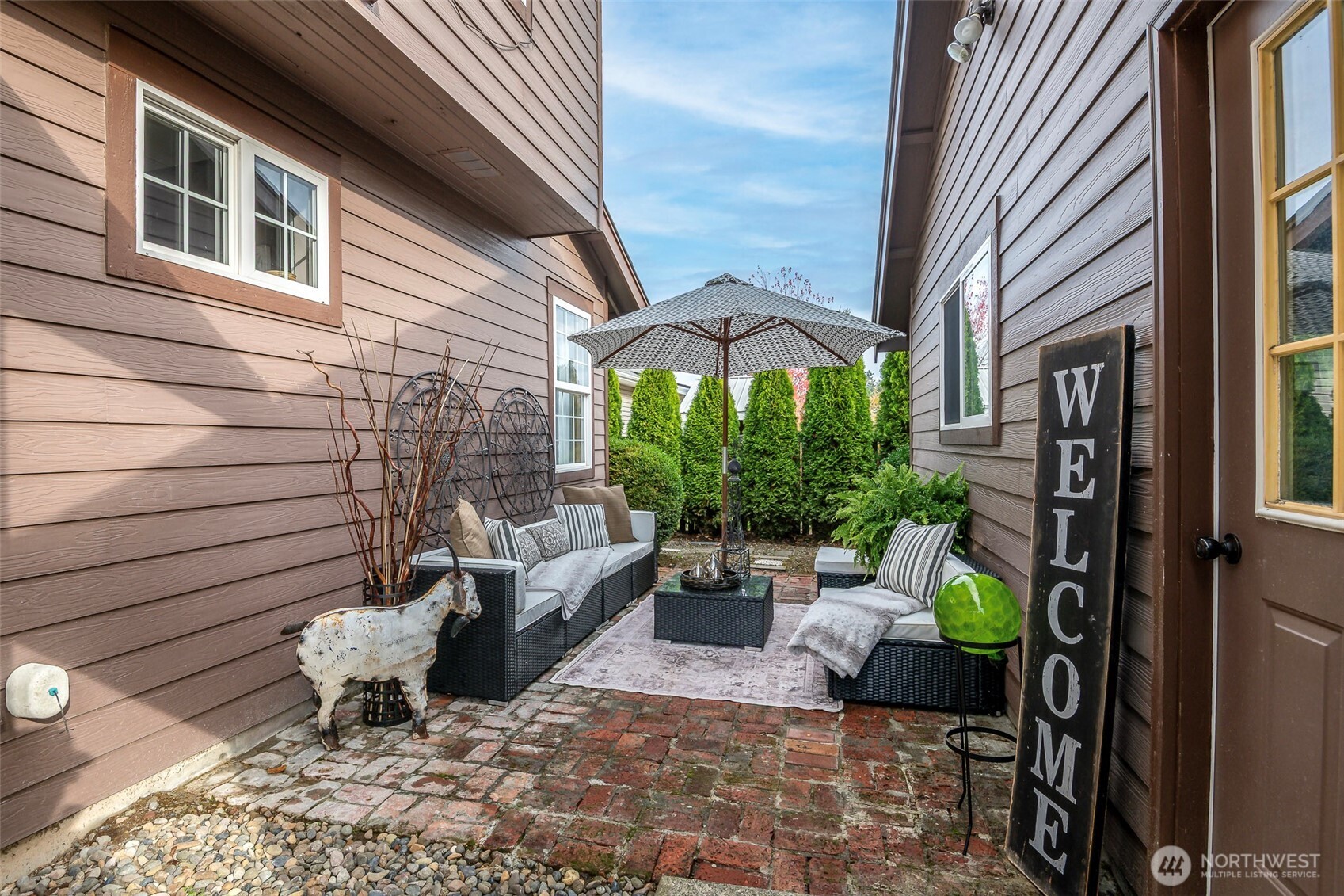 1310 Sequalish Street Steilacoom, WA 98388 - Photo 25 of 30 a outdoor view with a sitting space