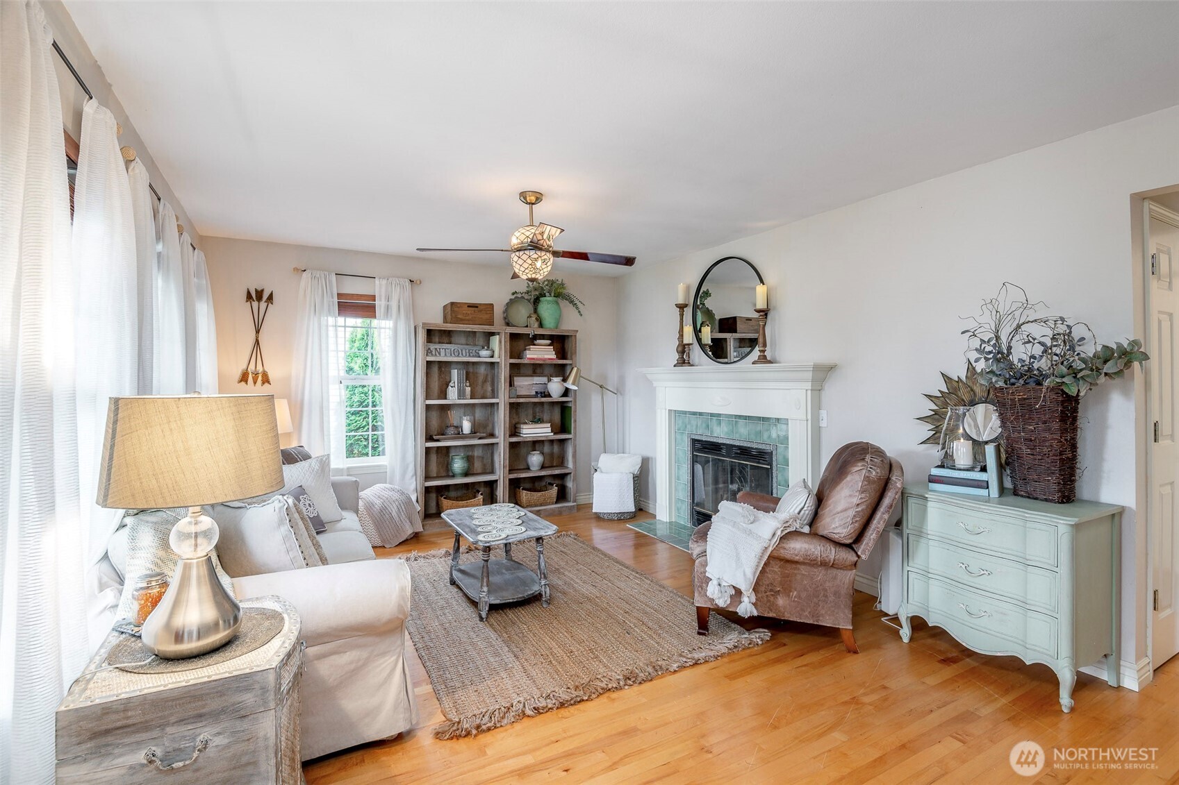 1310 Sequalish Street Steilacoom, WA 98388 - Photo 8 of 30 a living room with furniture and a fireplace