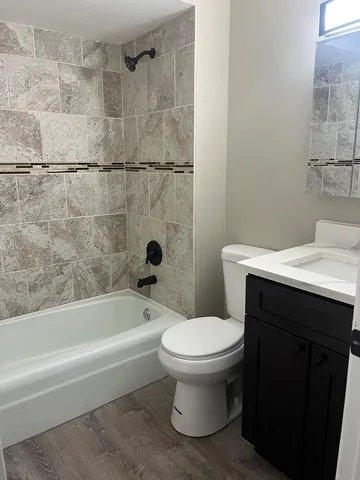 a bathroom with a sink and a toilet