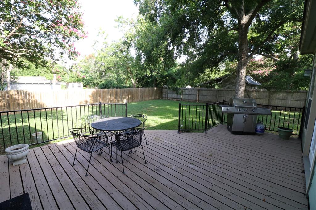 608 East 13th Street Georgetown, TX 78626 - Photo 19 of 22 a view of a deck with wooden floor and outdoor space