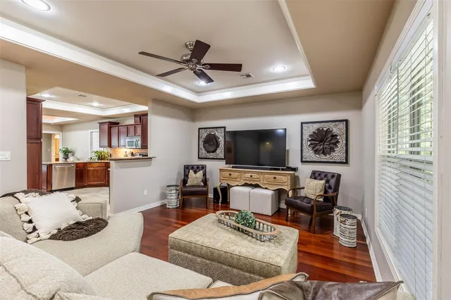 a kitchen with granite countertop stainless steel appliances and sink