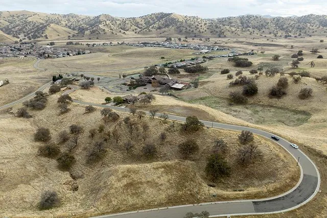 a view of ocean and mountain
