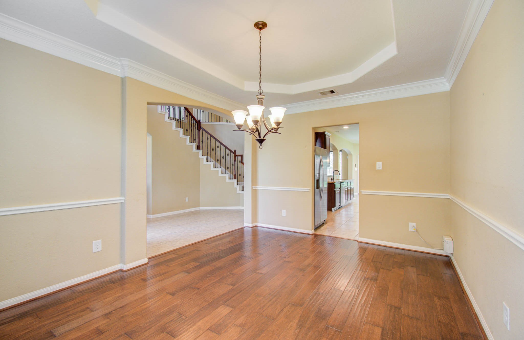 21331 Parham Circle Spring, TX 77388 - Photo 10 of 48 The formal dining room leads into the kitchen.