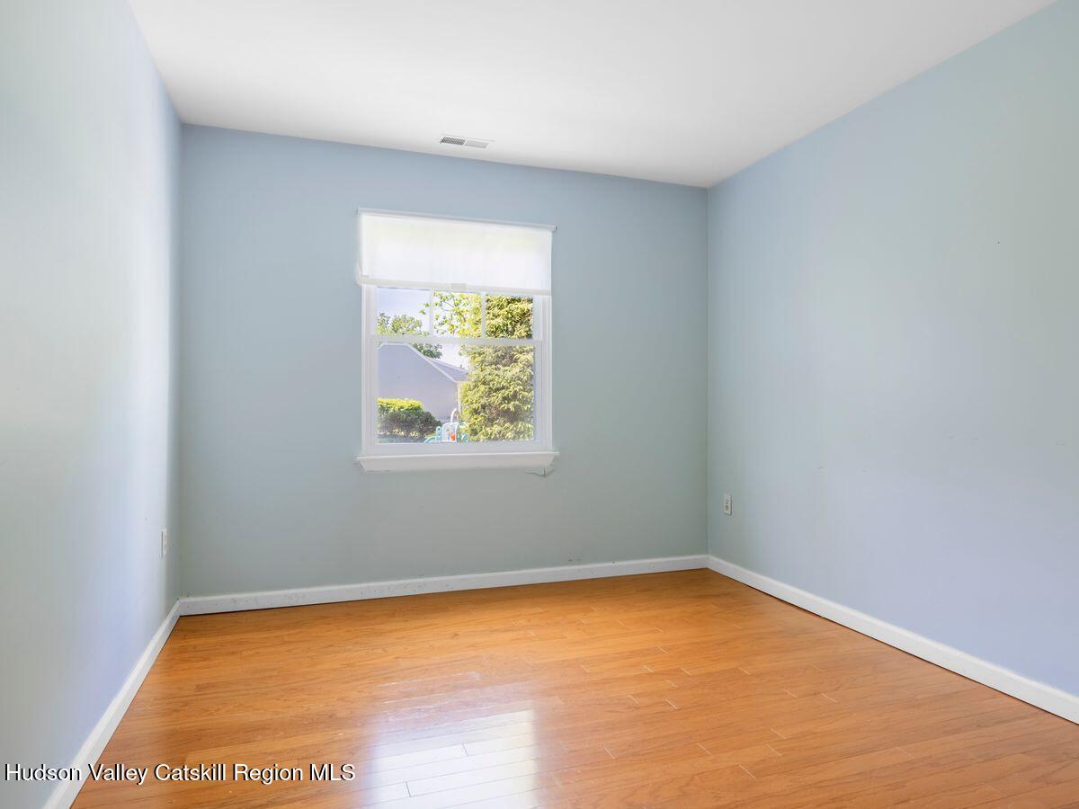 902 Commons Way, Unit B Fishkill, NY 12524 - Photo 17 of 24 an empty room with a window