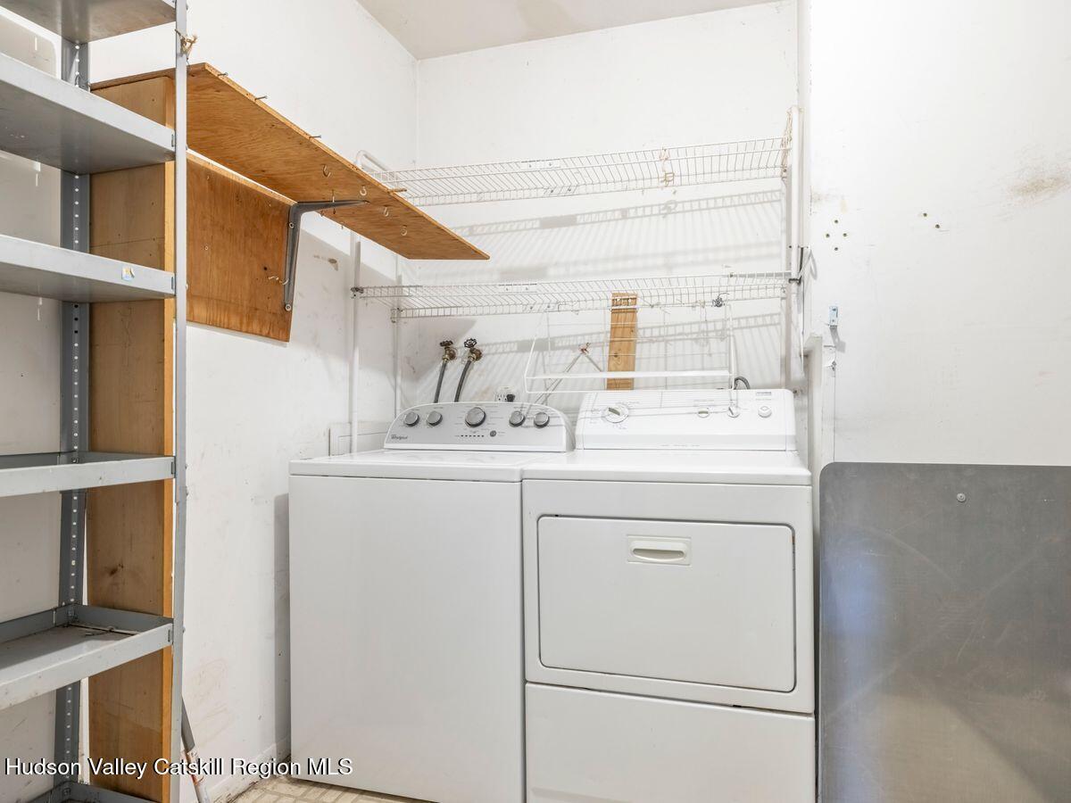 902 Commons Way, Unit B Fishkill, NY 12524 - Photo 20 of 24 a bathroom with a sink and a mirror