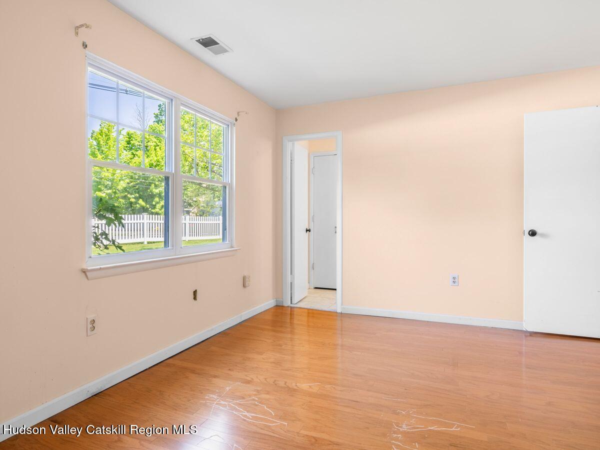 902 Commons Way, Unit B Fishkill, NY 12524 - Photo 22 of 24 an empty room with a window
