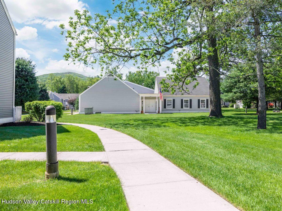 902 Commons Way, Unit B Fishkill, NY 12524 - Photo 3 of 24 a house that is sitting in the grass