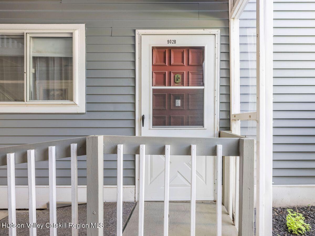 902 Commons Way, Unit B Fishkill, NY 12524 - Photo 5 of 24 a front view of a house with a porch