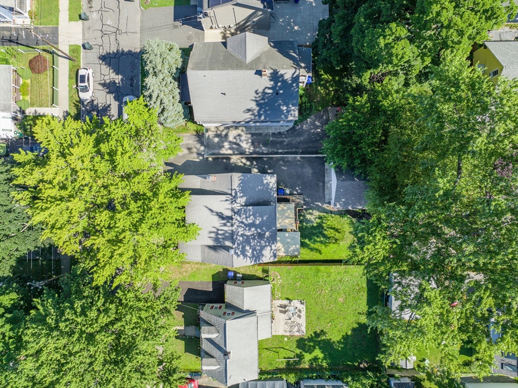 27 Powell Avenue Springfield, MA 01118 - Photo 28 of 34 an aerial view of a house with a garden