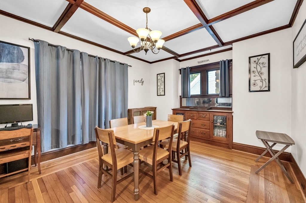 27 Powell Avenue Springfield, MA 01118 - Photo 9 of 34 a view of a dining room with furniture window and wooden floor