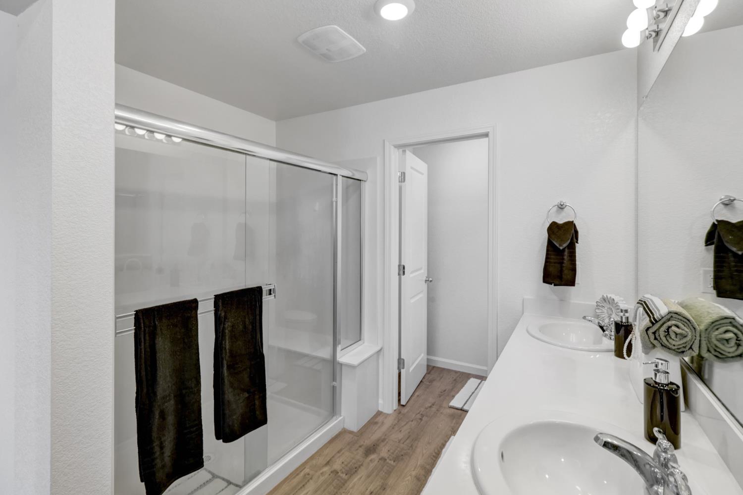 2887 Krone Way Antelope, CA 95843 - Photo 23 of 46 a bathroom with a sink and a mirror