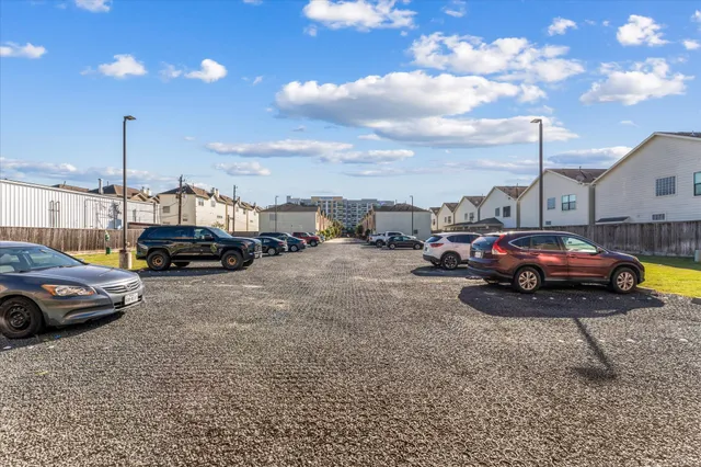 a view of cars parked in a parking lot