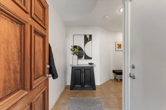 a view of hallway with washer and dryer