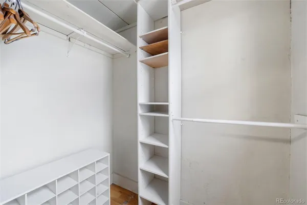 a view of an empty walk in closet