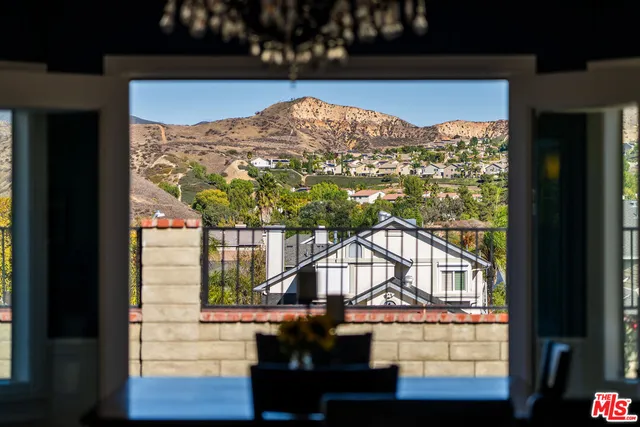 a view of a balcony with an outdoor space