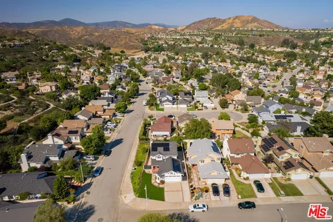 an aerial view of a city with lots of residential buildings