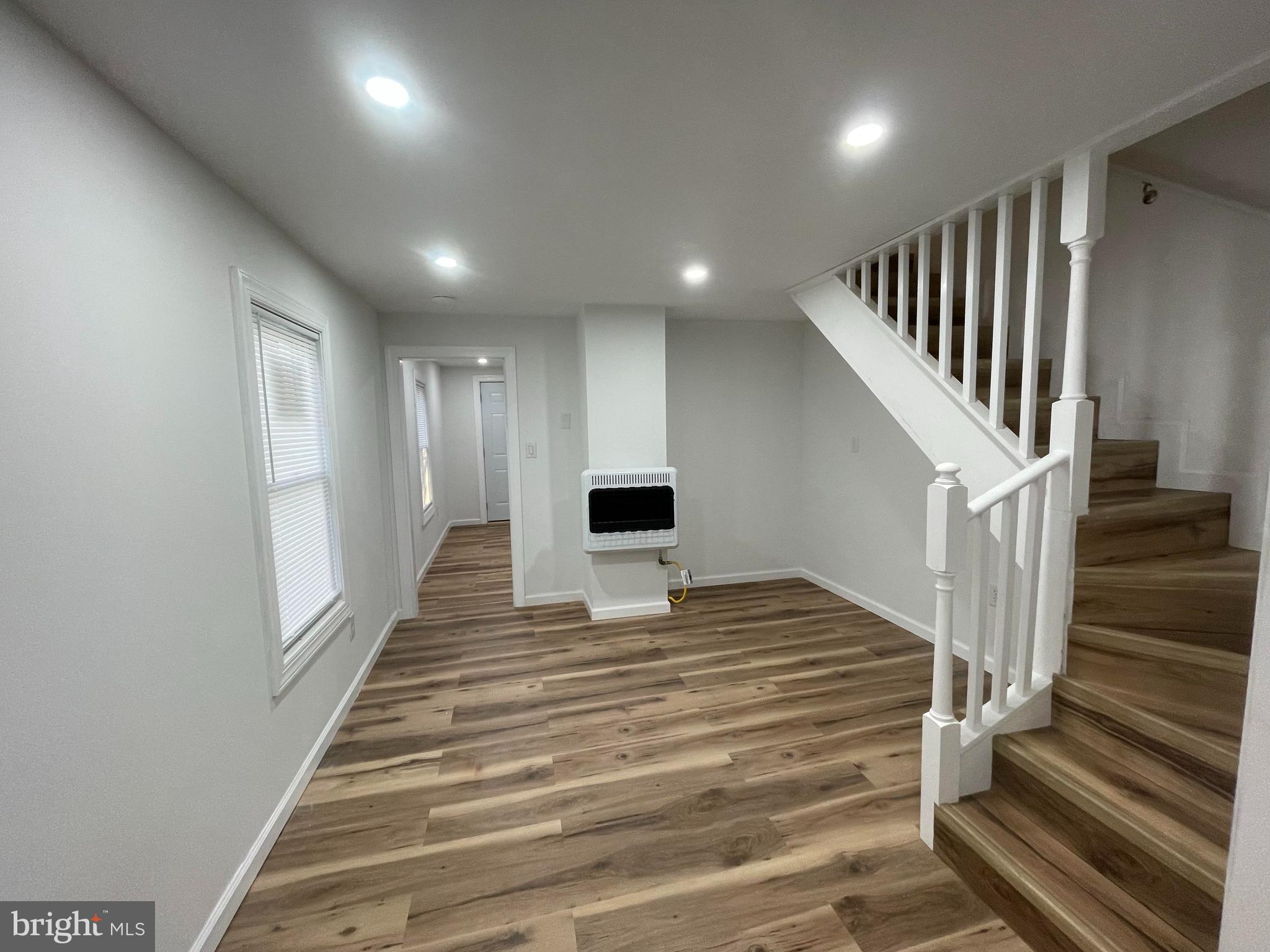 628-630 High Street Cambridge, MD 21613 - Photo 12 of 16 a view of entryway and hall with wooden floor
